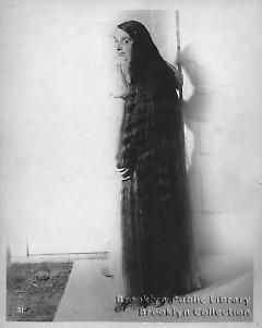 [Young woman with floor length hair