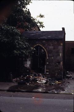 [Small stone and brick building]