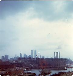 [Cranes and Manhattan skyline]