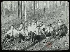 [Group portrait of boys on a forest hike]