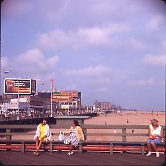 [Women sitting on pier bench], Coney Island