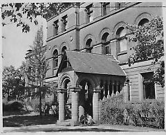 [Two male students at entrance of Pratt Institute Library]