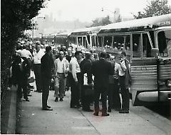 [Workers taking buses to rally at Madison Square Garden]