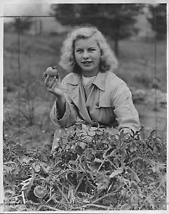 Pretty blonde gardener