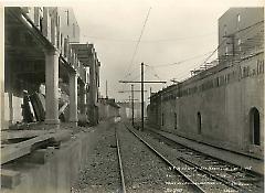 Looking east from 20th Ave. showing shoreing of houses and work on 23rd Ave. bridge