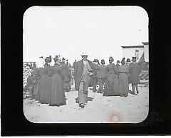 [Man in white hat at move of Hotel Brighton]