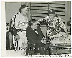 [Two Dodger scouts with Branch Rickey]