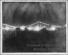 [Brooklyn Bridge at night]