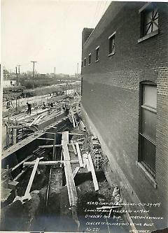 Looking east along sid[e] of New Utrecht Ave. sub station showing concrete foundations being built