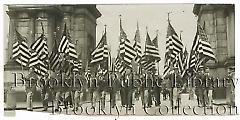 [Color guard marching at Grand Army Plaza]