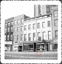 [Spina's Shoe Repair at #284 Fulton Street at left (now moved.)]