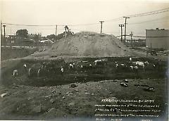 Showing excavations for 4th Ave. sub station at 4th Ave. and 64th St. looking west showing pile of excavation material from 4th Ave. subway excavation