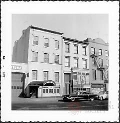 [#219 Atlantic Avenue (left,) a funeral chapel.]