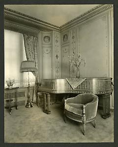 Weil-Worgelt apartment; piano and upholstered chair in French eighteenth-century revival style.