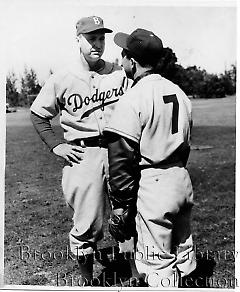 [Walter Alston in uniform talking to player]