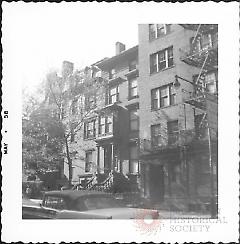 [Portion of #70 Pierrepont Street (far right), then (right to left) # 76, #80, and Hotel Palm at corner of Henry Street (obscured by foliage).]