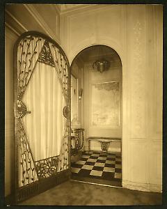 Weil-Worgelt apartment; Art Deco metalwork door with view to hallway.