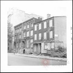 [Old houses on east side of Lawrence Street between Johnson Street and Tillary Street.]