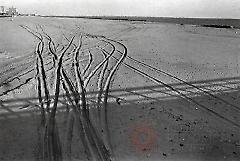 [Tracks in sand at Coney Island]