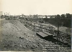 Birds eye view, operations and steel work between 4th and 5th Aves. looking southeast from 64th St. west of 4th Ave.