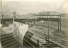 Looking north from retaining wall east of Fort Hamilton Ave. showing steel work for station