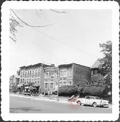 [View along 86th Street (north side) looking northwest toward northeast corner of 86th Street and 12th Avenue.]