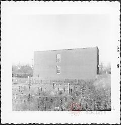 [View of southwest side of E. 104th Street.]