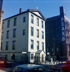 [Yellow church on north side of Middagh Street.]