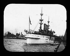 Views: U.S. Columbian Celebration: Oct. 1892. View 004: Navy Yard. Sugar refinieries in distance. USS New York ready to go to Rio.