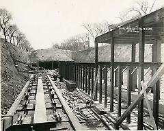 [Subway construction with scaffolding in trench]