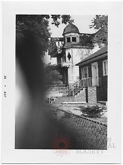 [Fire damaged house on 81st Street.]