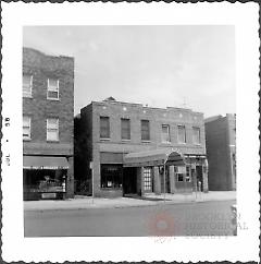 [De Mill(e)'s Funeral Home, #1725 86th Street (left).]