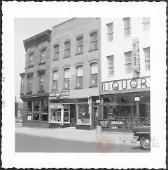 [#7 Greene Avenue at right (the liquor store).]