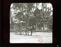 [Horse-drawn cart]