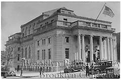 [Former courthouse in Sunset Park with flag flying]