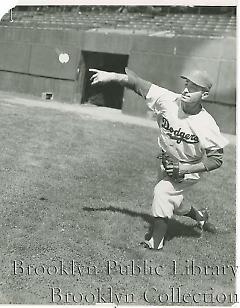 [Carl Furillo practicing in right field]