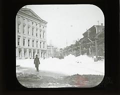 [Man standing in front of City Hall after the blizzard]