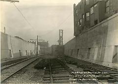 Looking east at 20th Ave. curve showing roadbed and retaining walls