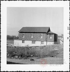 [View of south or southwest side of E. 103rd Street.]