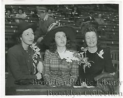 [Three women at baseball game]