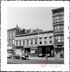 [At far right (only a portion showing) is B & L Grocery Delicatessen, #921 Fulton Street.]
