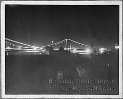 [Brooklyn Bridge at night]