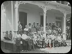 [Group portrait on outdoor porch]