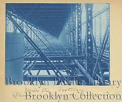 [Brookyn Bridge under construction]