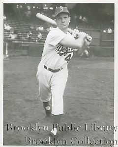 [Andy Pafko taking practice swings]