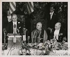 Truman applauds