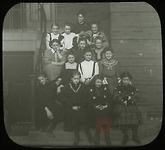 [Group portrait of Miss Stanton and girls]