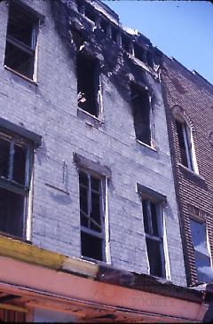 [View of fire-damaged rowhouse]