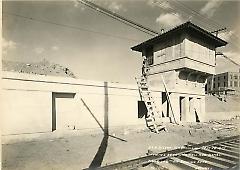 Showing retaining wall and signal tower at 6th Ave. looking east