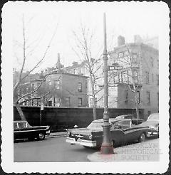 [Rear of houses facing on south side of Remsen Street taken from Grace Court Alley.]